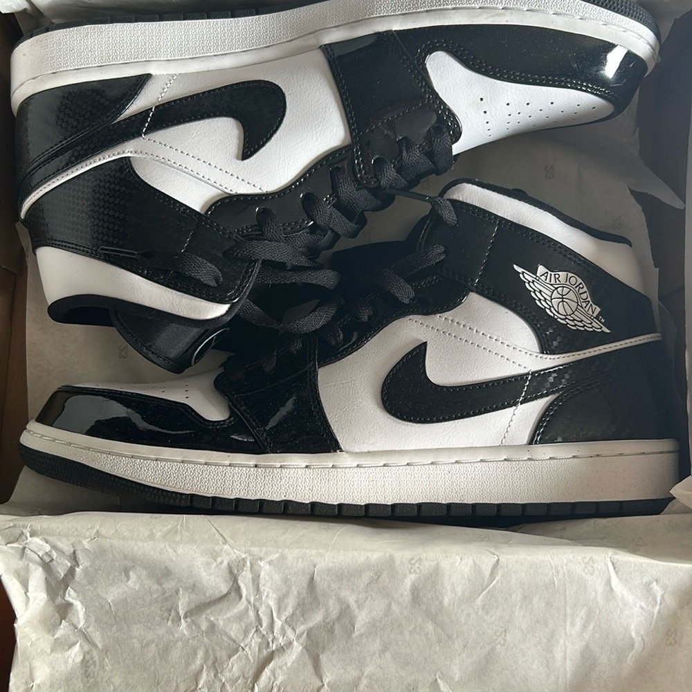 Nike Jordan Black and mid Top Sneakers